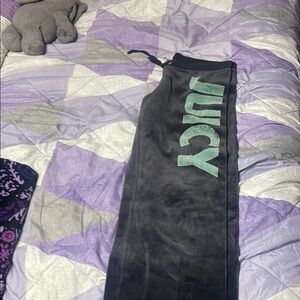Juicy Couture Black Sweatpants with Bold Graphic Design